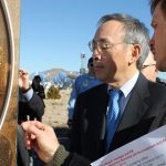 Energy Secretary Steven Chu, left, examines coatings at Sandia National Laboratories in Albuquerque, N.M., on Thursday, Jan. 26, 2012.