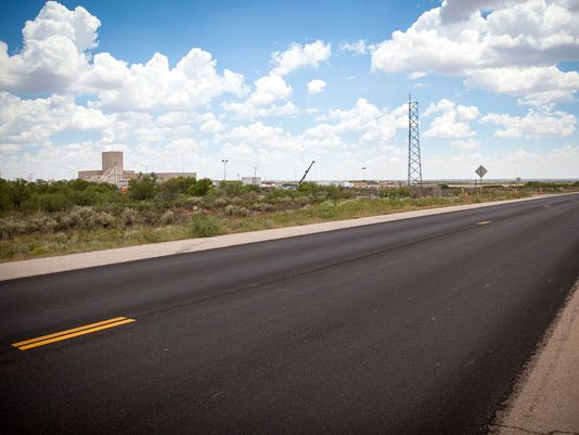 A 13 mile strip of the WIPP north access road was resurfaced as a part of the settlement