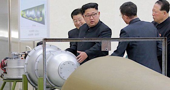 Kim Jong Un and H-Bomb fitting nose cone of ICBM