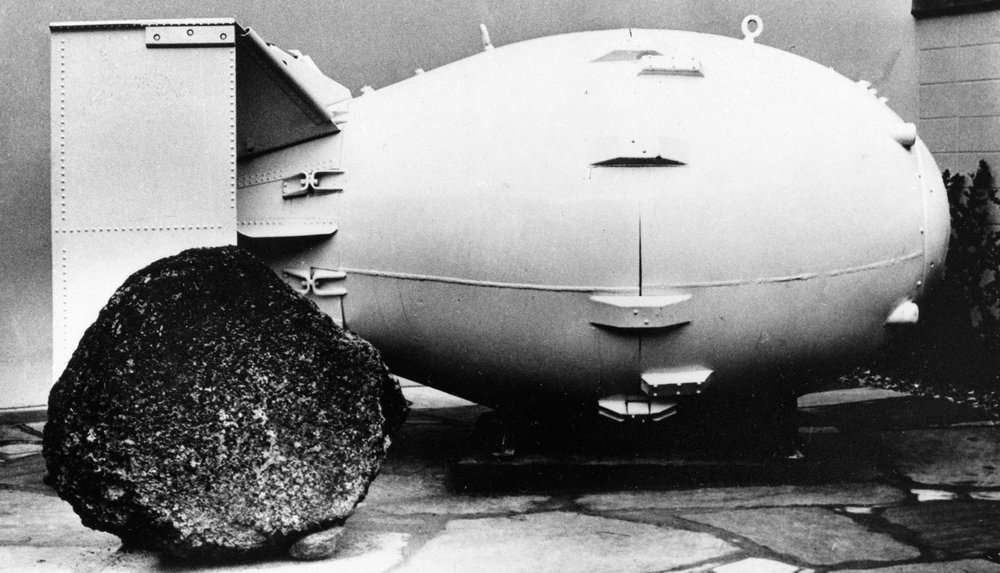 FILE - This Oct. 15, 1965, file photo shows a "Fat Man" nuclear bomb of the type tested at Trinity Site, N.M, and dropped on Nagasaki, Japan in 1945, on view for the public at the Los Alamos Scientific Laboratory Museum. A compensation program for those exposed to radiation from years of nuclear weapons testing and uranium mining would be expanded under legislation that seeks to address fallout across the western United States, Guam and the Northern Mariana Islands. (AP Photo, File)