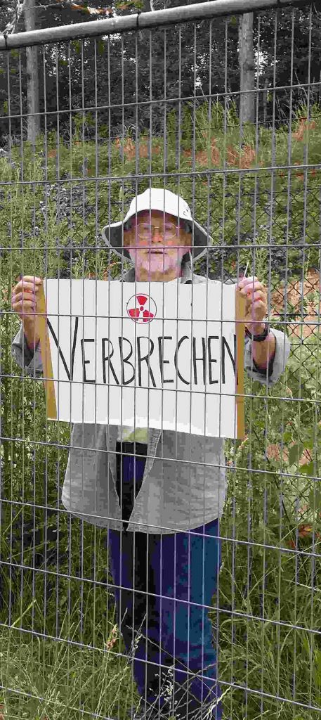 “Crime” reads the sign of the “Treaty Enforcement Action” activist who entered the Buechel nuclear weapons base on July 10, 2019.