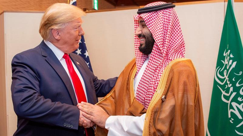 Saudi Arabia's Crown Prince Mohammed bin Salman shakes hands with US President Donald Trump, at the G20 leaders summit in Osaka, Japan, June 29, 2019 [Handout via Reuters]