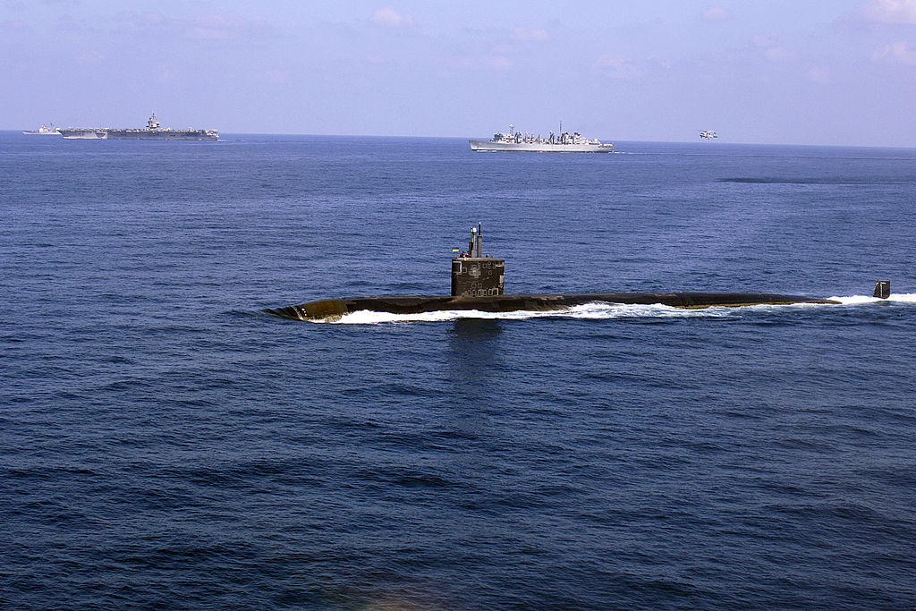 ARABIAN SEA (Nov. 13, 2007) The nuclear-powered attack submarine USS Miami (SSN 755) steams through the Arabian Sea along with the nuclear-powered aircraft carrier USS Enterprise (CVN 65), Military Sealift Command fast combat support ship USNS Supply (T-AOE 6), and the guided-missile cruiser USS Gettysburg (CG 64). U.S. Navy photo by Mass Communication Specialist Seaman Kiona M. Mckissack